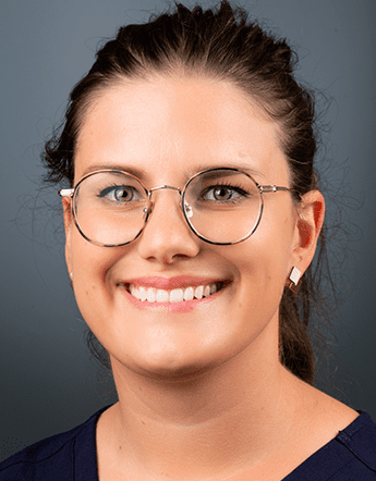 Dr. Laetitia Duler smiling for her headshot photo